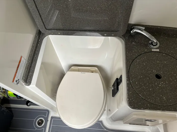  Yacht Photos Pics 2017 HCB Speciale boat bathroom with toilet and compact sink.