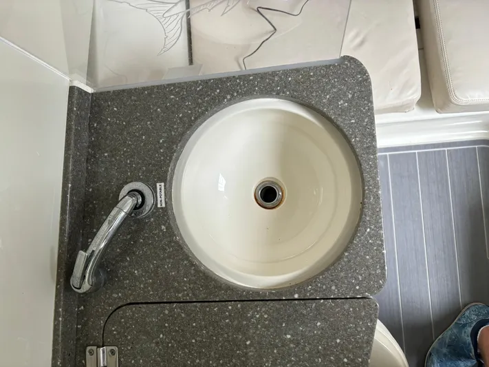  Yacht Photos Pics Round sink with faucet on a gray countertop in a 2017 HCB Speciale.