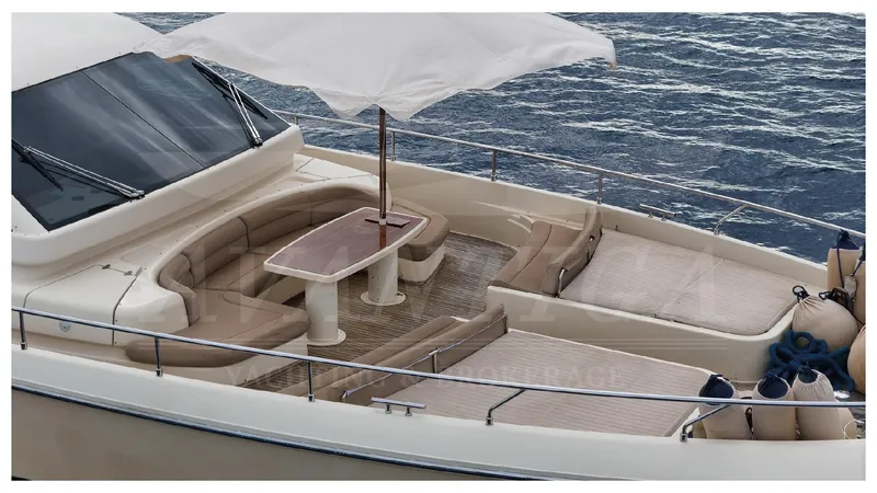  Yacht Photos Pics Luxury Ferretti Yachts Altura 840, 2010 model, featuring elegant deck seating and ocean backdrop.