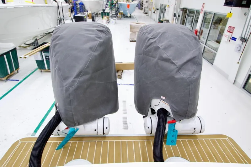 31-406 Yacht Photos Pics Covered engines on a 2026 Regulator 31 boat in a manufacturing facility.