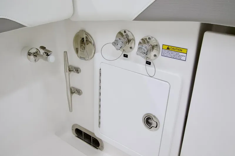 31-406 Yacht Photos Pics 2026 Regulator 31 boat control panel with caution label and fittings.