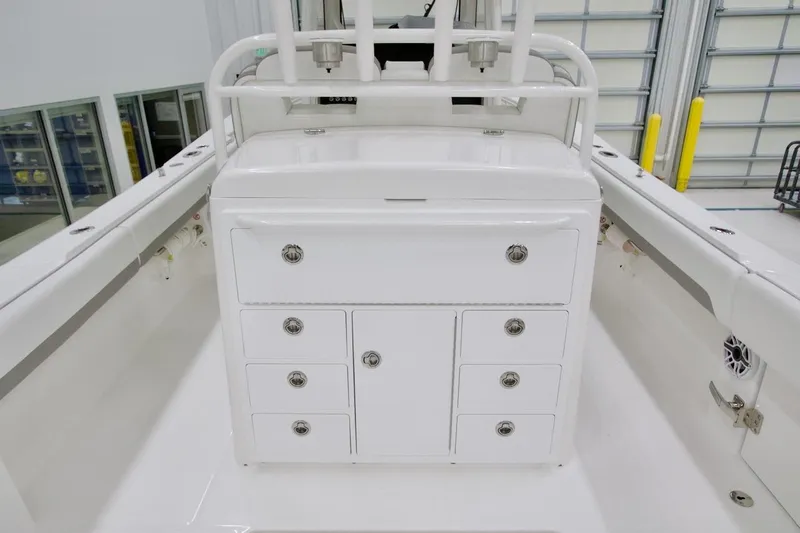 31-406 Yacht Photos Pics 2026 Regulator 31 boat interior with white storage cabinets and sleek design.
