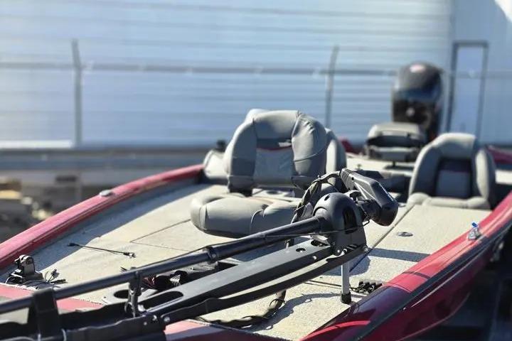 2021 Tracker Pro Team 195 TXW Tournament Edition fishing boat with seating and equipment.
