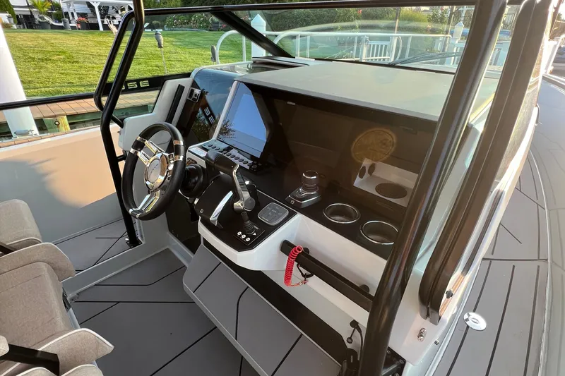  Yacht Photos Pics Cockpit of 2023 Saxdor 320 GTO boat with modern steering and controls.