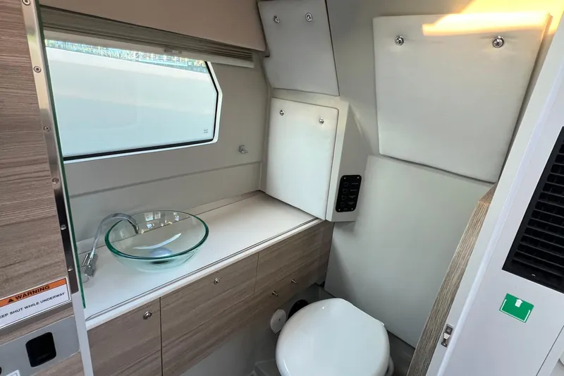  Yacht Photos Pics 2023 Saxdor 320 GTO bathroom interior with modern sink and toilet.