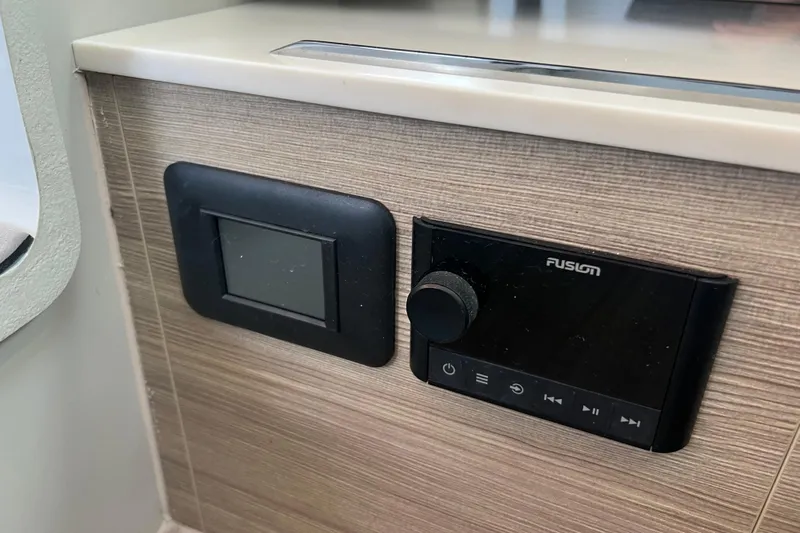  Yacht Photos Pics Control panel in 2023 Saxdor 320 GTO boat interior, featuring Fusion audio system.