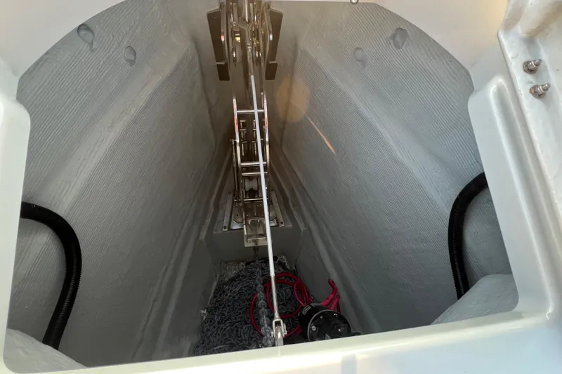  Yacht Photos Pics Anchor compartment of 2023 Saxdor 320 GTO boat, featuring chain and winch system.