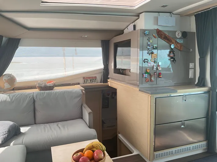 Anth'r'flo Yacht Photos Pics Luxurious 2017 Fountaine Pajot Helia yacht interior with modern decor and fruit bowl.