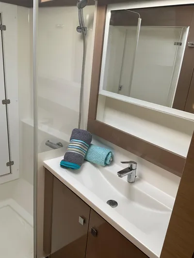 Anth'r'flo Yacht Photos Pics Modern bathroom in 2017 Fountaine Pajot Helia catamaran with sleek sink and shower.