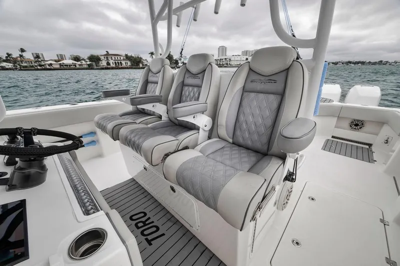Toro Yacht Photos Pics Helm seat with bolsters and armrests down