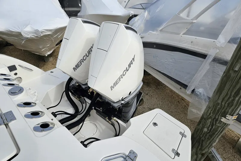  Yacht Photos Pics 2023 Sailfish 316 DC boat with dual Mercury outboard engines.