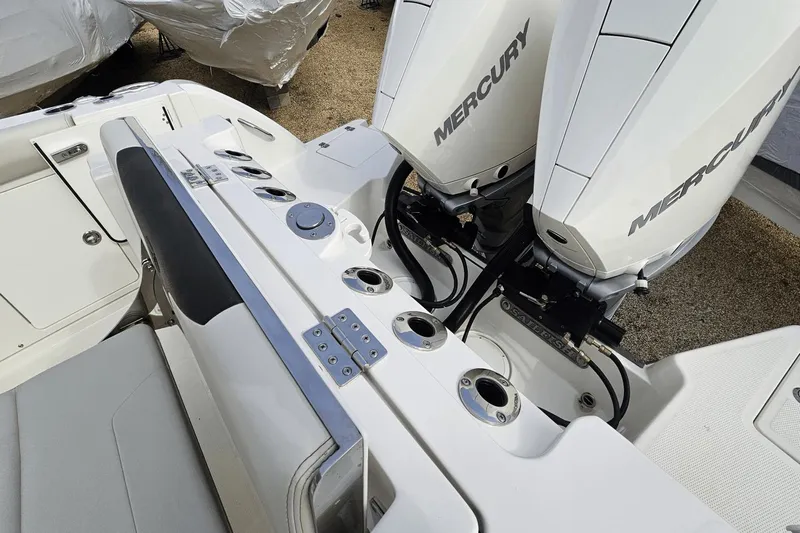  Yacht Photos Pics 2023 Sailfish 316 DC boat with dual Mercury outboard engines and rod holders.