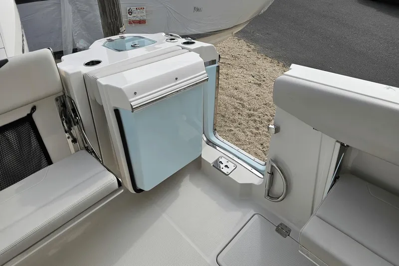  Yacht Photos Pics 2023 Sailfish 316 DC boat interior with seating and storage compartment.