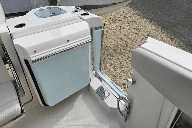  Yacht Photos Pics 2023 Sailfish 316 DC boat interior with seating and storage compartment.