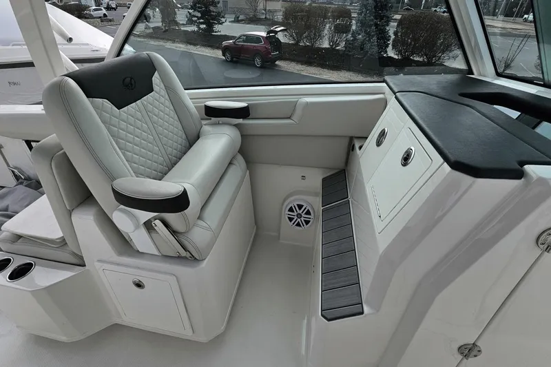  Yacht Photos Pics 2023 Sailfish 316 DC boat interior with luxurious seating and modern design.