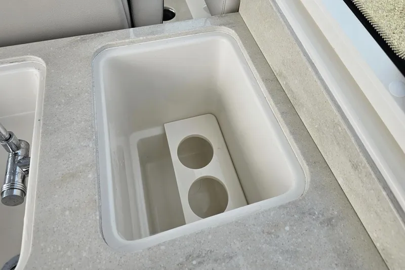 Yacht Photos Pics Built-in sink with cup holders on 2023 Sailfish 316 DC boat.