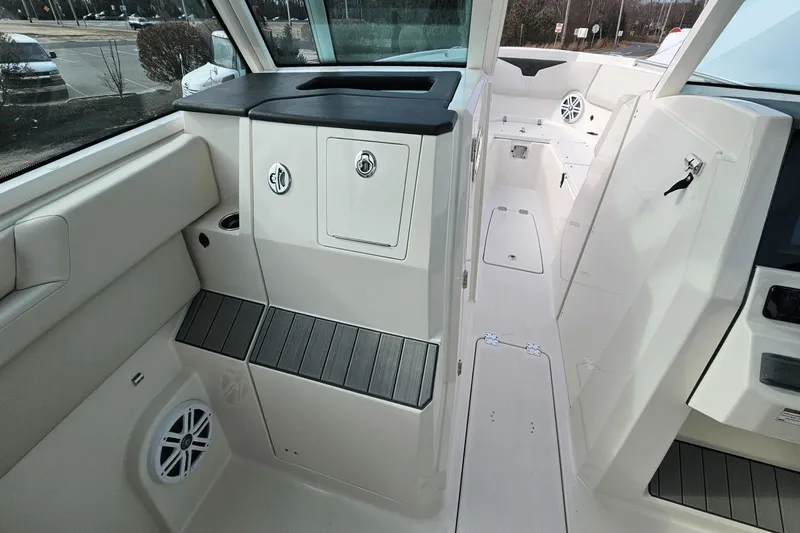  Yacht Photos Pics 2023 Sailfish 316 DC boat interior with sleek design and modern amenities.