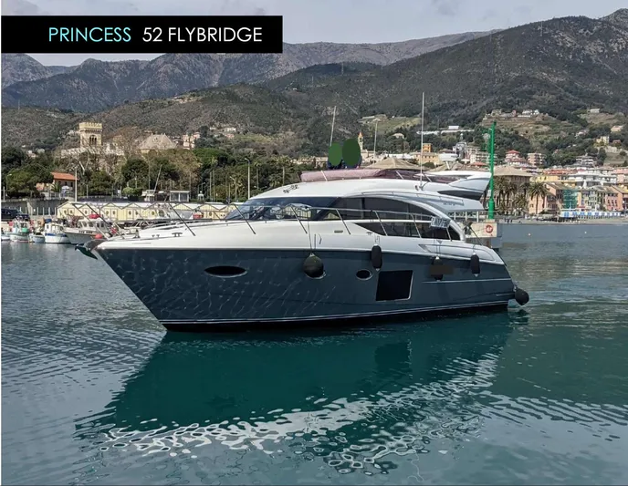  Yacht Photos Pics Luxury 2014 Princess 52 Flybridge yacht docked in scenic harbor.