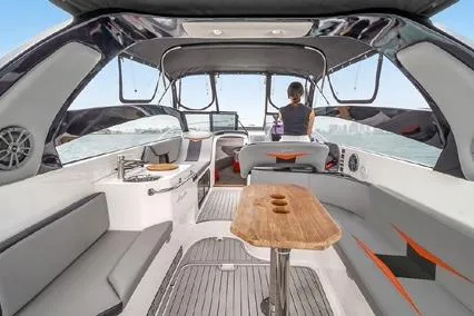  Yacht Photos Pics 2024 Hanover 305 Sport Edition boat interior with modern seating and navigation controls.