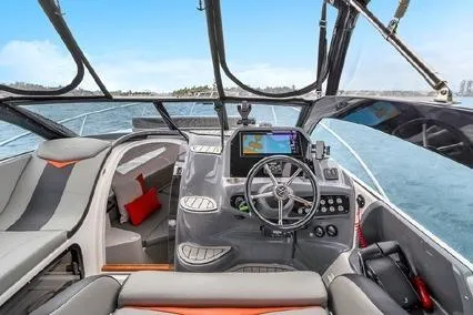  Yacht Photos Pics 2024 Hanover 305 Sport Edition boat interior with modern dashboard and navigation system.
