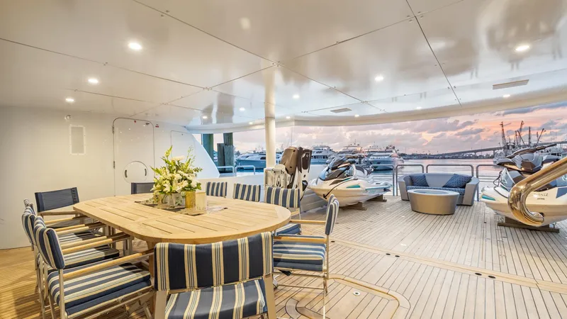 My Spirit Yacht Photos Pics Luxurious 2005 New Zealand Yachts Wave Piercer deck with elegant seating and ocean view.