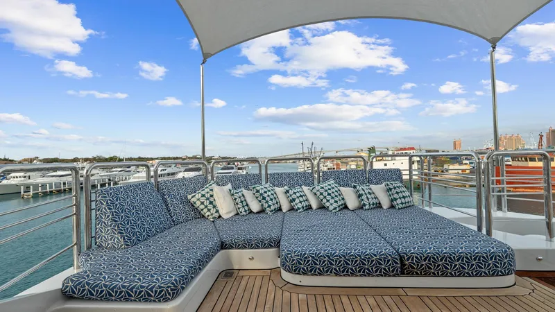 My Spirit Yacht Photos Pics Luxurious 2005 New Zealand Yachts Wave Piercer deck with stylish seating and ocean view.