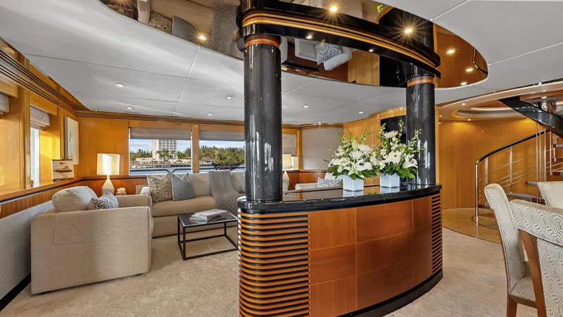 My Spirit Yacht Photos Pics Luxurious 2005 New Zealand Yachts Wave Piercer interior with elegant seating and floral arrangement.