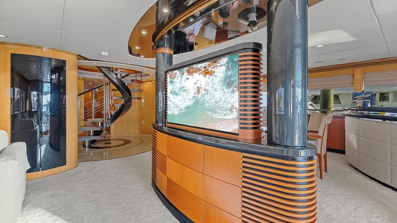 My Spirit Yacht Photos Pics Luxurious interior of 2005 New Zealand Yachts Wave Piercer with modern design and spiral staircase.