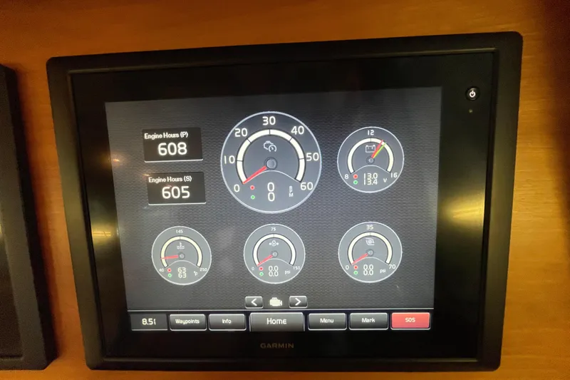  Yacht Photos Pics Garmin display showing engine metrics on 2014 Sabre 42 Salon Express boat.