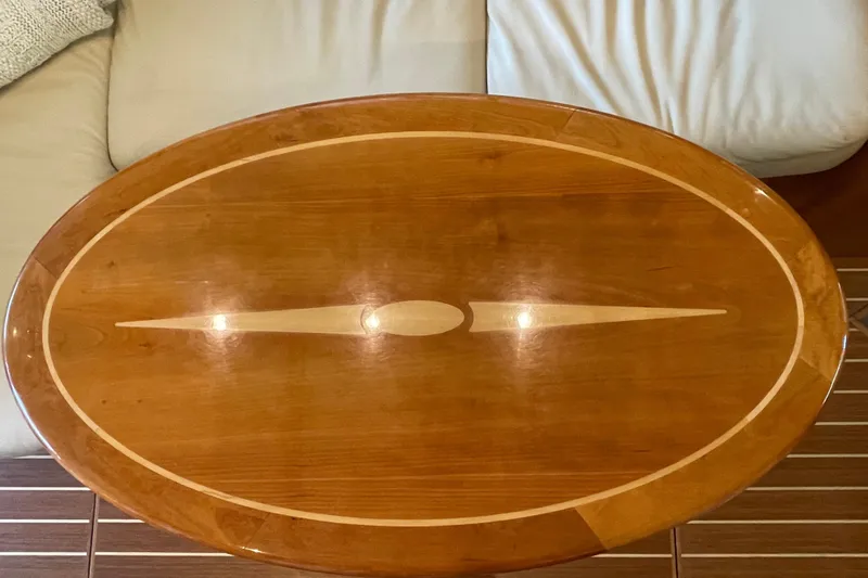  Yacht Photos Pics Oval wooden table with inlay design on a Sabre 42 Salon Express, 2014 model.