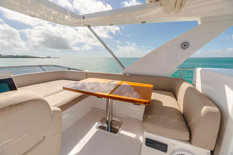 Blessed Yacht Photos Pics Luxurious seating area on 2020 Azimut AZ 50-Fly yacht with ocean view.
