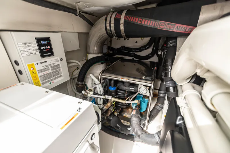 Blessed Yacht Photos Pics Engine room of 2020 Azimut AZ 50-Fly yacht, showcasing mechanical components and systems.