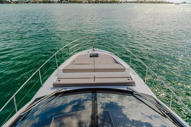 Blessed Yacht Photos Pics Azimut AZ 50-Fly 2020 yacht cruising on serene waters, showcasing luxurious deck design.