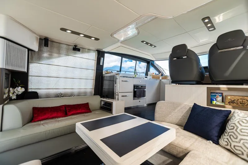 Blessed Yacht Photos Pics Luxurious interior of 2020 Azimut AZ 50-Fly yacht with modern seating and elegant decor.