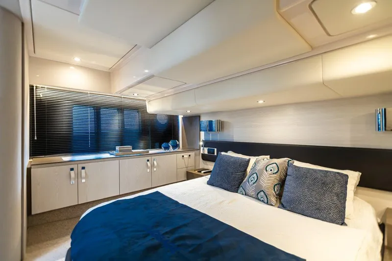 Blessed Yacht Photos Pics Luxurious bedroom interior of 2020 Azimut AZ 50-Fly yacht with modern decor.