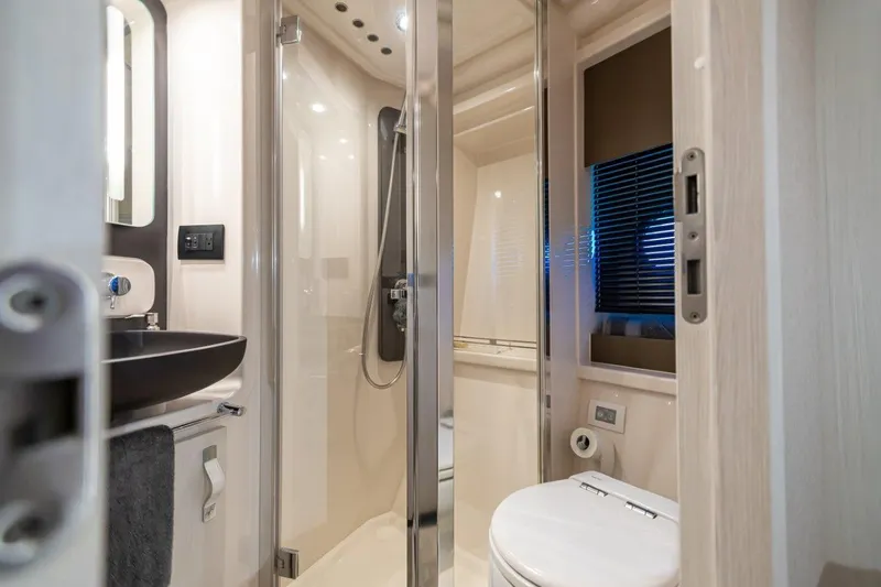 Blessed Yacht Photos Pics Luxurious bathroom in 2020 Azimut AZ 50-Fly yacht with modern fixtures.
