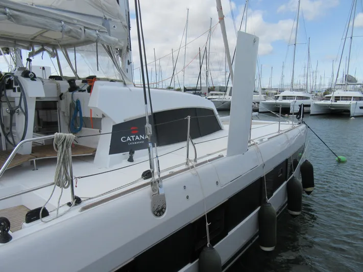 Heby Yacht Photos Pics 2023 Catana OC 50 yacht docked in marina, surrounded by other boats.