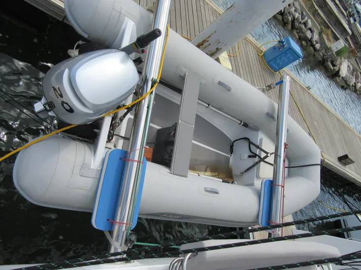 Heby Yacht Photos Pics Inflatable boat with outboard motor docked, Catana OC 50, 2023 model.