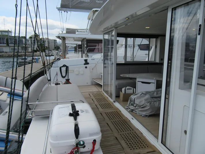Heby Yacht Photos Pics 2023 Catana OC 50 yacht docked, featuring spacious deck and modern interior.