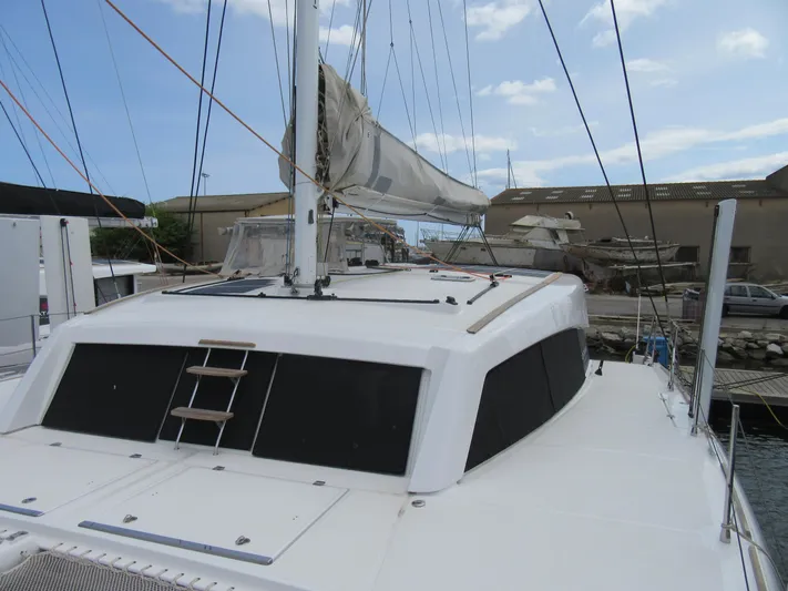 Heby Yacht Photos Pics 2023 Catana OC 50 catamaran docked, featuring sleek design and modern rigging.