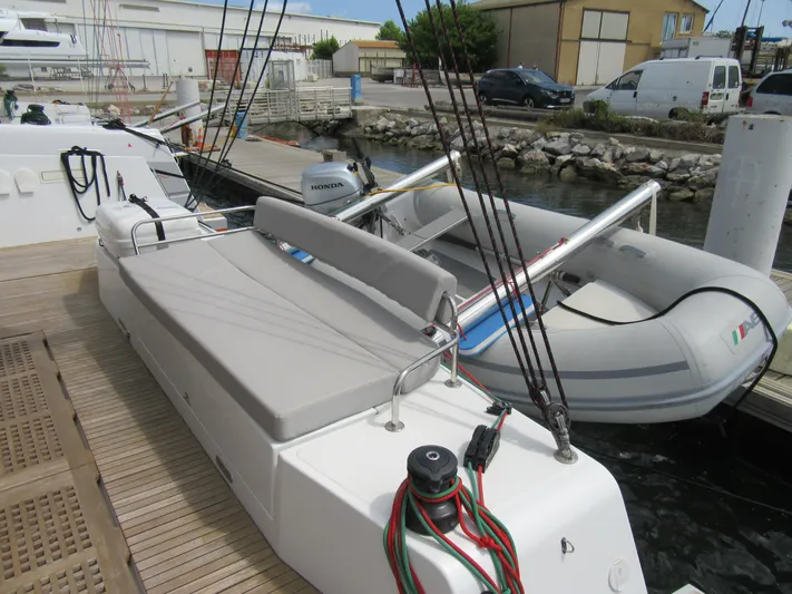 Heby Yacht Photos Pics 2023 Catana OC 50 yacht with inflatable dinghy docked at marina.