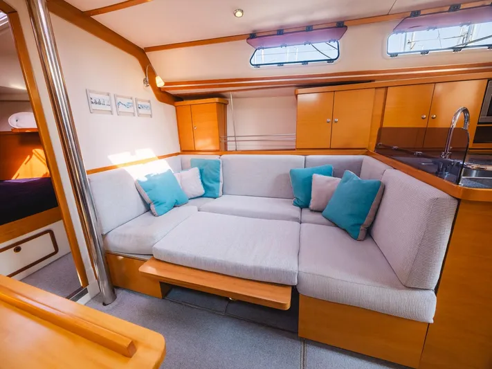  Yacht Photos Pics Interior of 2006 Hanse 370 yacht with cozy seating and modern design.