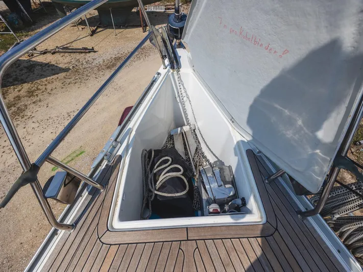  Yacht Photos Pics Anchor locker of a 2006 Hanse 370 sailboat with ropes and chain.