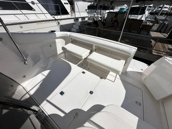Barbie Hunter Yacht Photos Pics 2007 Regal 4080 Flybridge Sedan yacht interior with white seating and deck.