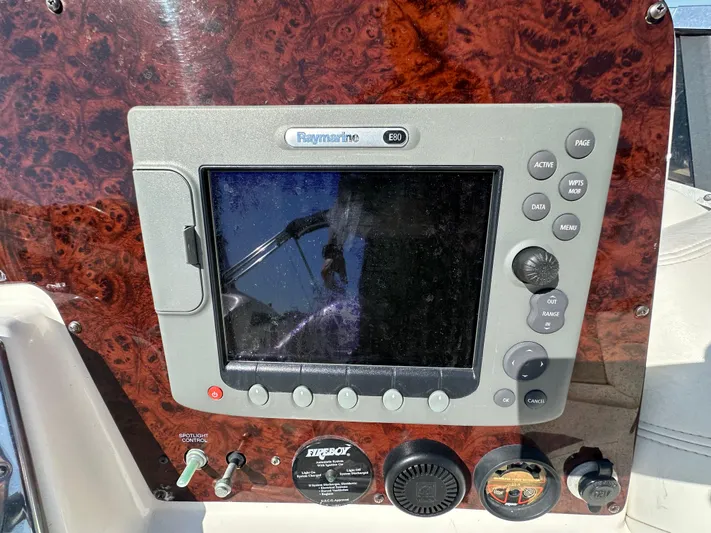 Barbie Hunter Yacht Photos Pics Raymarine E80 display on 2007 Regal 4080 Flybridge Sedan boat dashboard.