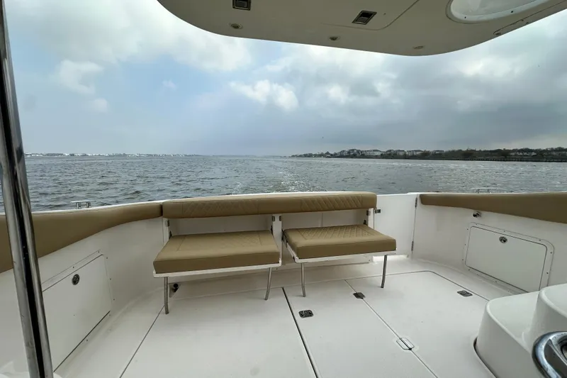 Barbie Hunter Yacht Photos Pics Regal 4080 Flybridge Sedan 2007 with ocean view.