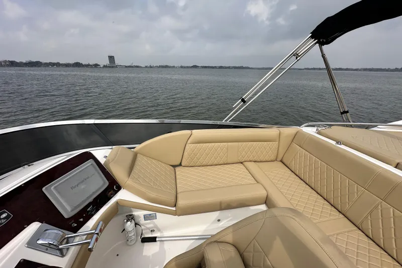 Barbie Hunter Yacht Photos Pics 2007 Regal 4080 Flybridge Sedan with luxurious seating on the water.