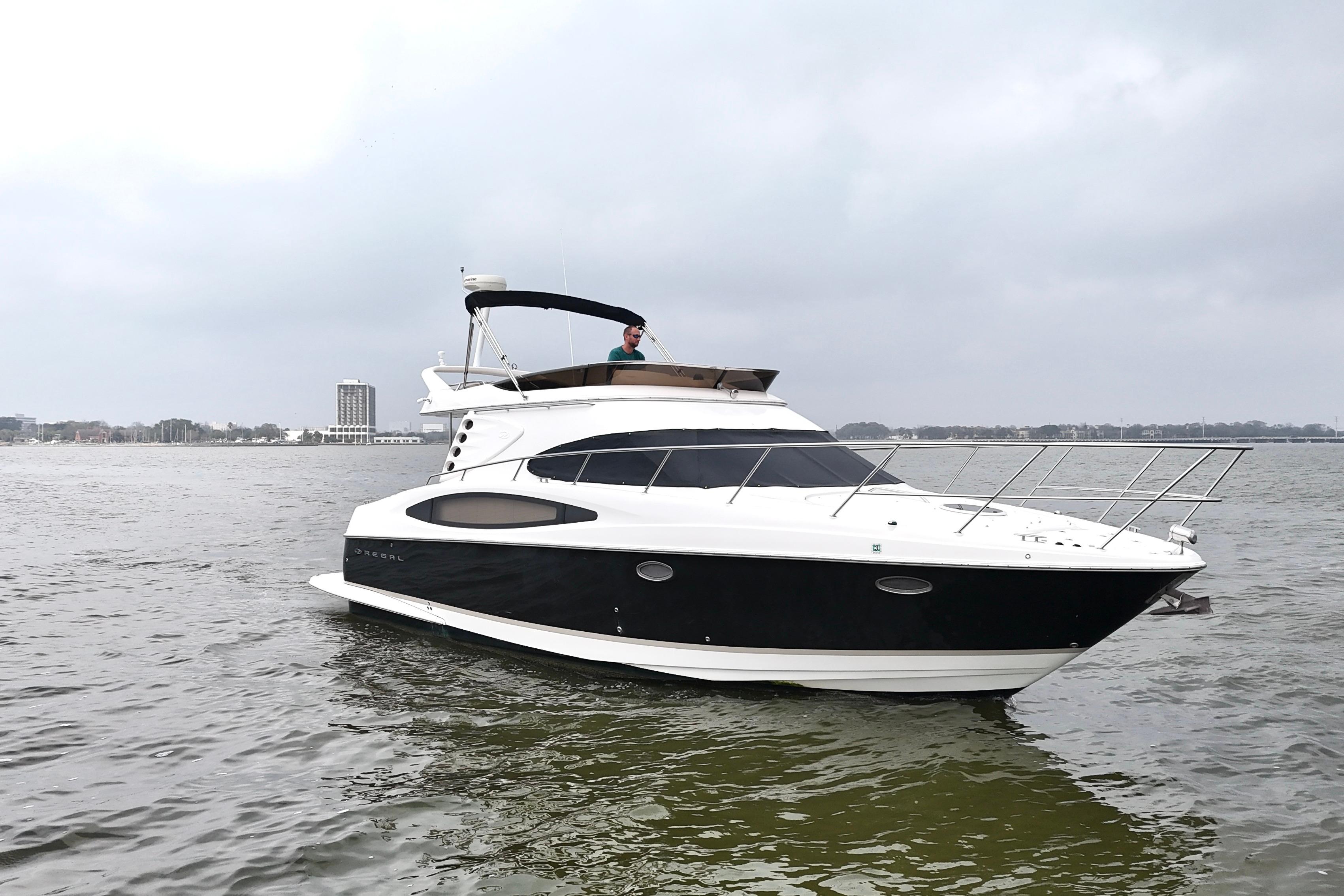 2007 Regal 4080 Flybridge Sedan on calm waters.