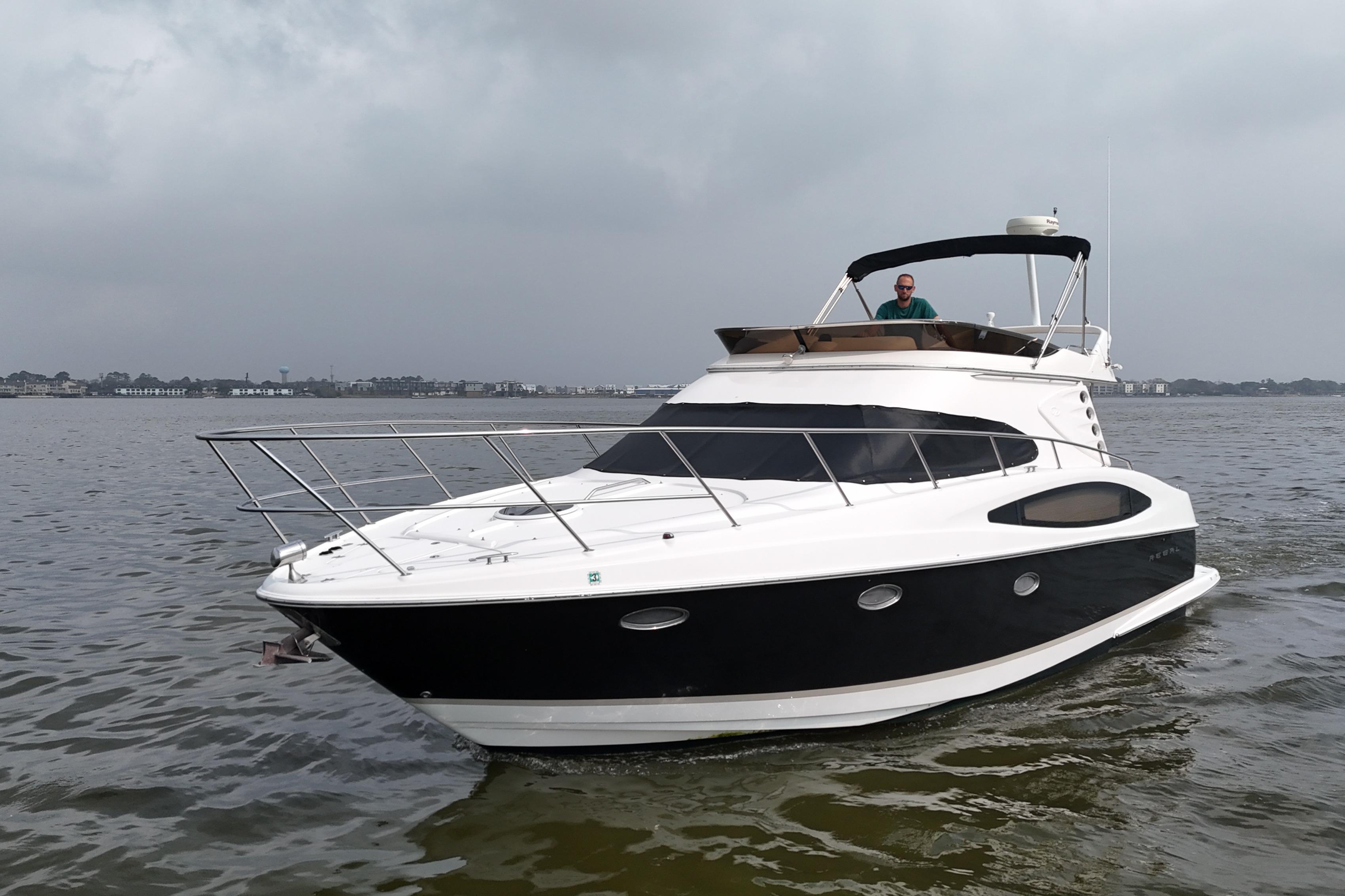 2007 Regal 4080 Flybridge Sedan on calm waters.
