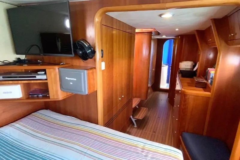  Yacht Photos Pics Interior of 2003 Catana 522 Ocean Class yacht with wood paneling and modern amenities.